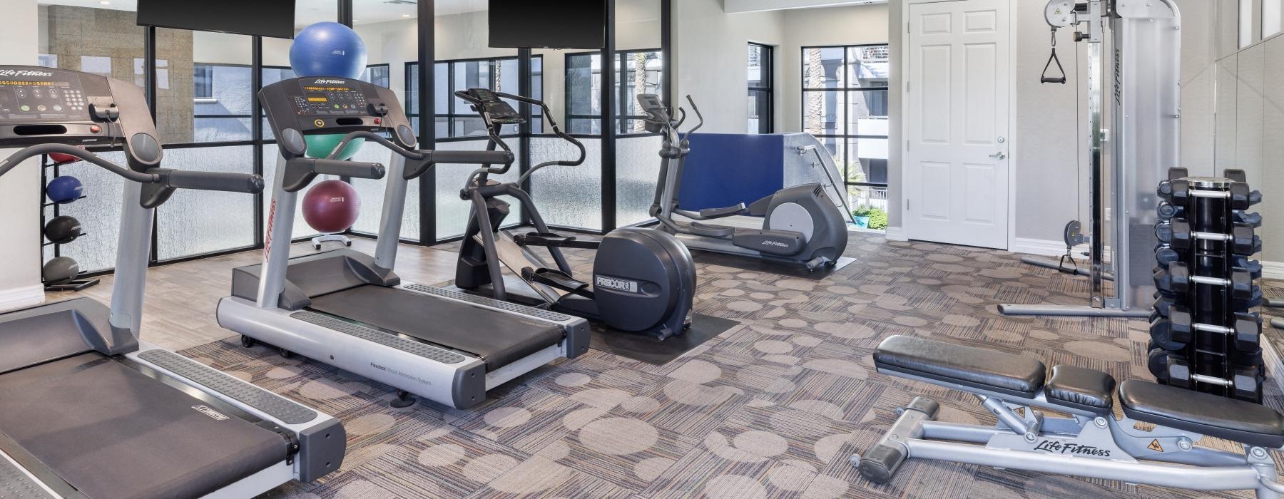 a gym with exercise equipment
