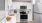 a kitchen with white cabinets