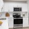 a kitchen with white cabinets