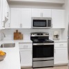 Well-lit kitchen with ample counter space