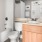 a bathroom with a sink toilet and bathtub