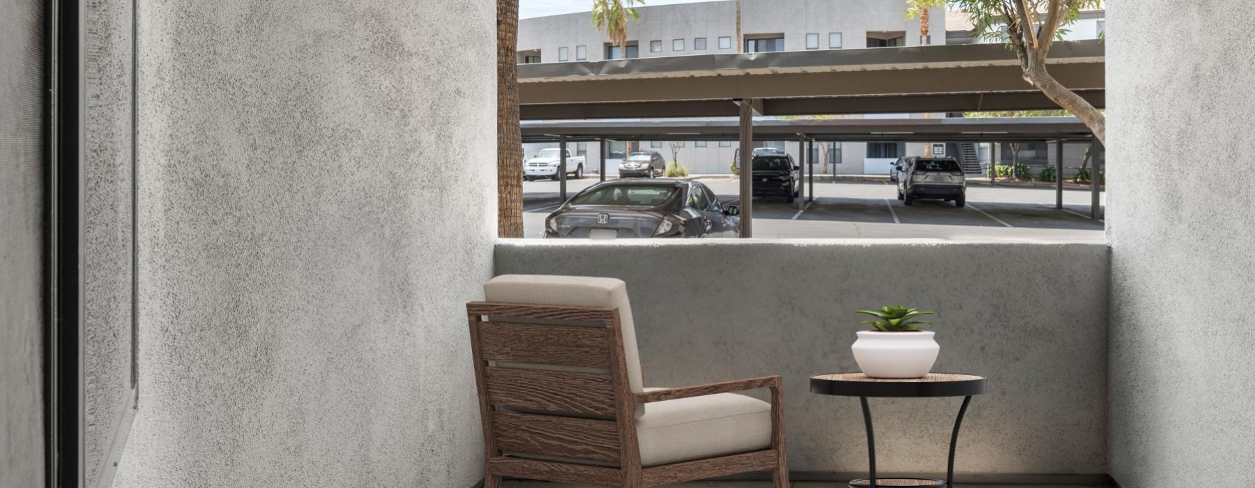 furnished patio facing parking lot